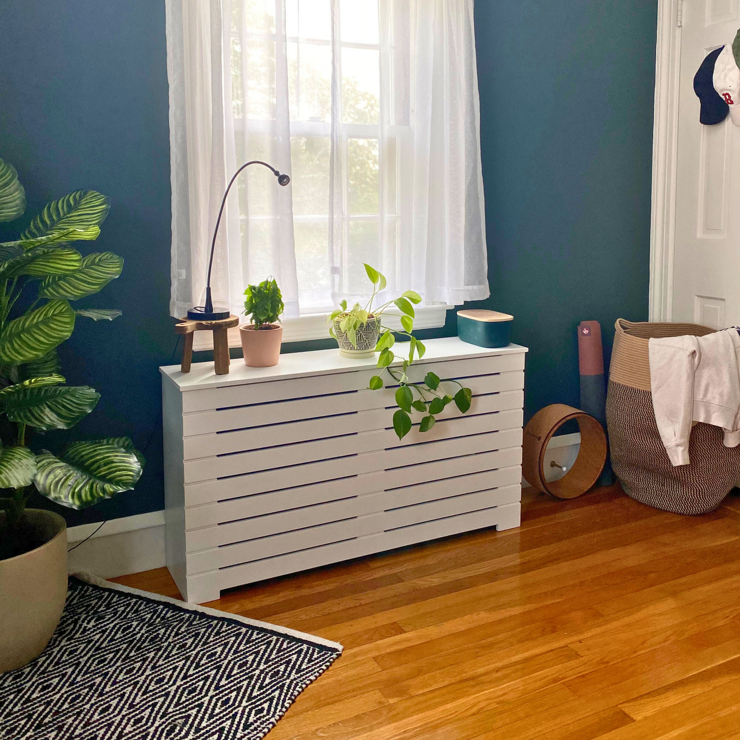 Is it a good idea to cover radiators? What can I use instead of a radiator cover? Is it safe to put things on a radiator cover? What type of radiator cover is best? What is the best material to cover a radiator? Why can't you cover a radiator?