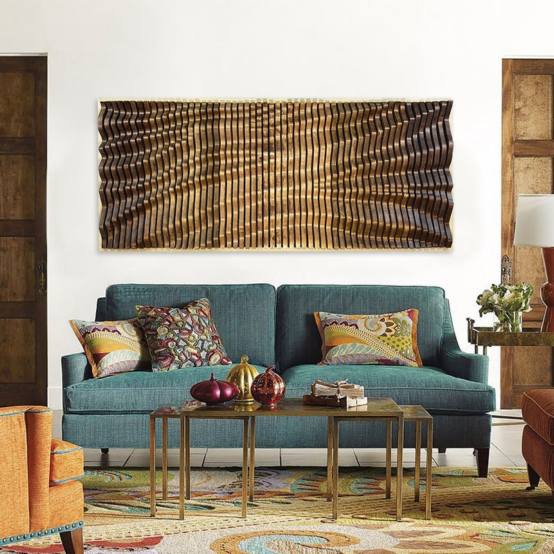 AURA Parametric Wood Wall Art - Unique Acoustic Decor Made in USA displayed above a teal sofa in a colorful living room, enhancing modern interior design.