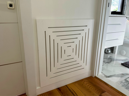 Close-up detail of smooth white Medex wood surface on magnetic vent cover