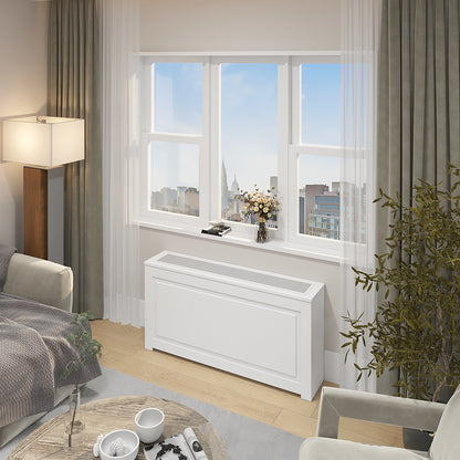 Custom PTAC HVAC cover NYC with white metal grille, precision-made for a perfect fit in modern apartment living room. Durable, decorative enclosure solution.