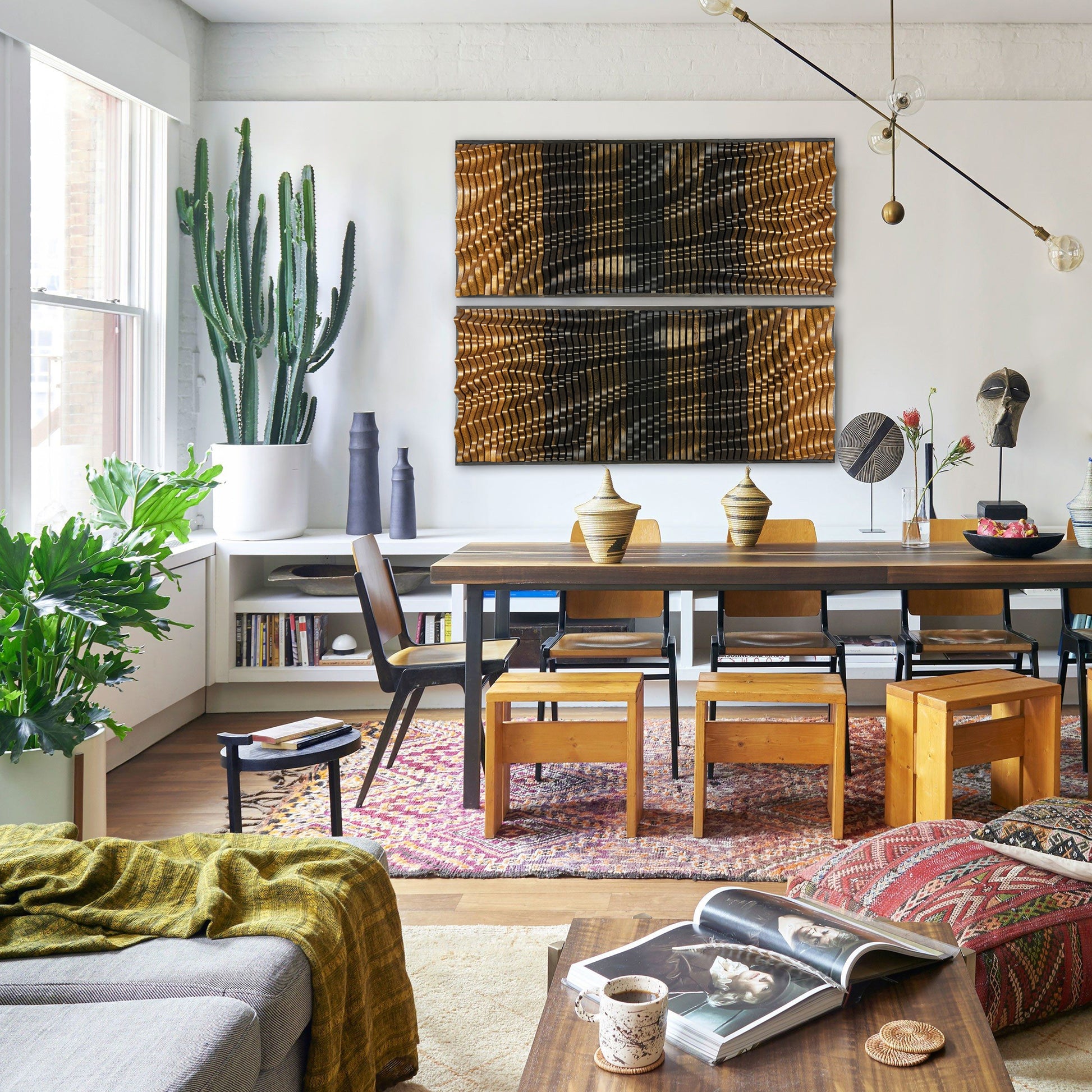 Dual-panel ECLIPSE Wall Art in a boho-style dining area with eclectic decor and natural lighting, adding texture and warmth to the room.