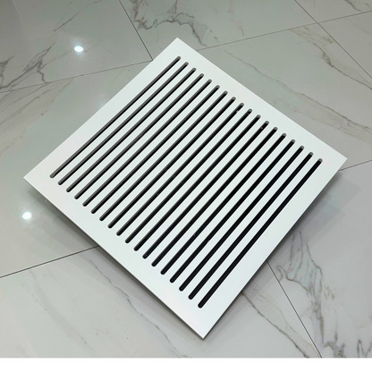 Large white magnetic air vent cover placed over HVAC opening with tool-free installation