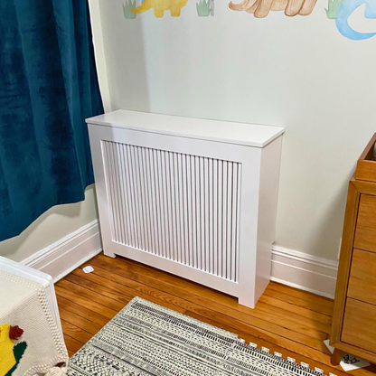 What are the benefits of using radiator covers in home decor? How can radiator covers enhance heating efficiency? What materials are commonly used in radiator cover construction? Are there customizable options for radiator covers? Can radiator covers be painted or stained to match room decor? Are radiator covers easy to install and maintain? Are there safety considerations when using radiator covers?