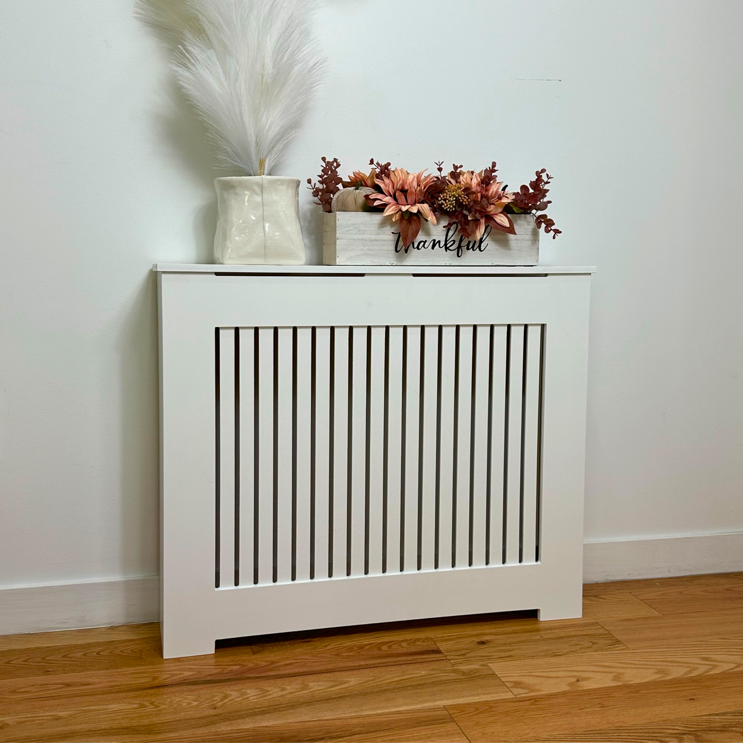 Is it a good idea to cover radiators? What can I use instead of a radiator cover? Is it safe to put things on a radiator cover? What type of radiator cover is best? What is the best material to cover a radiator? Why can't you cover a radiator?