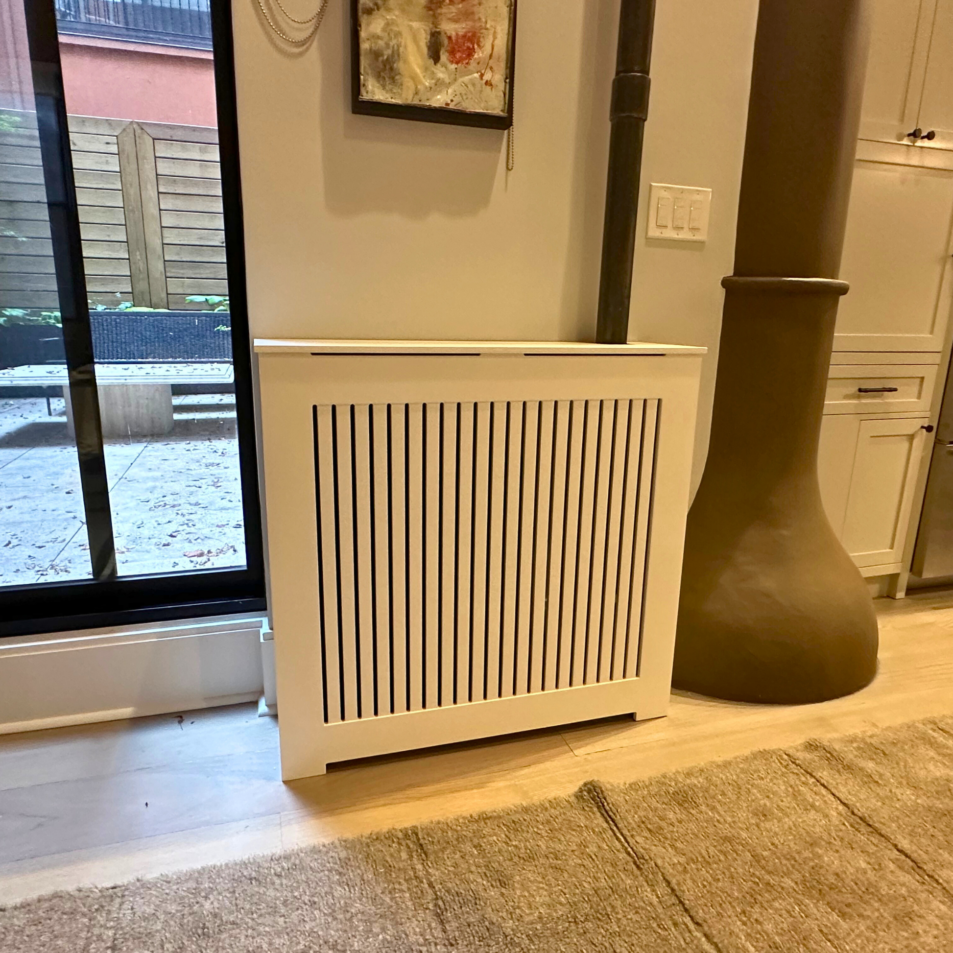 Is it a good idea to cover radiators? What can I use instead of a radiator cover? Is it safe to put things on a radiator cover? What type of radiator cover is best? What is the best material to cover a radiator? Why can't you cover a radiator?