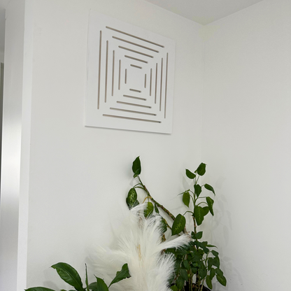 White magnetic air vent cover installed on wall in modern interior