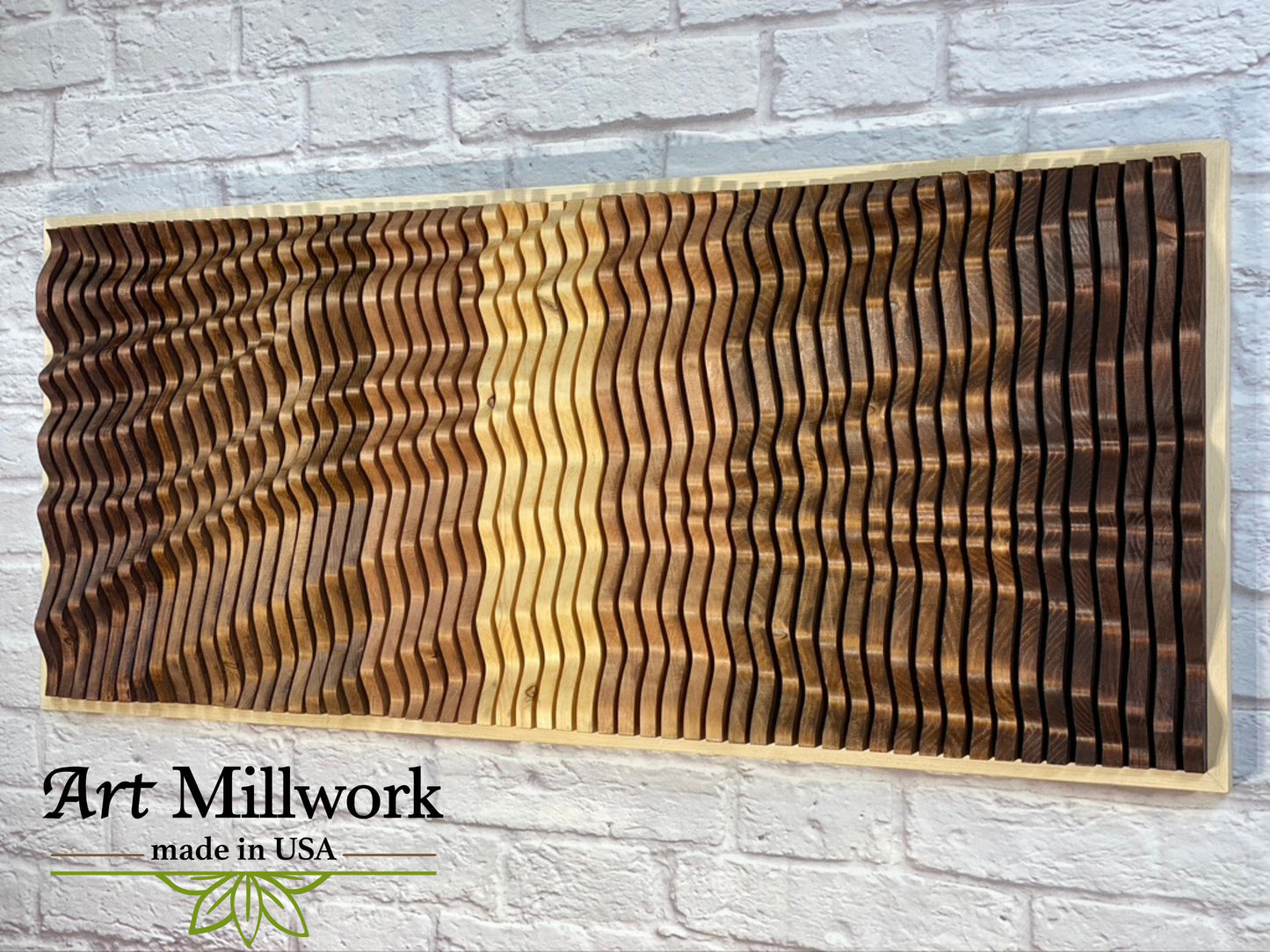Close-up of VORTEX acoustic wood wall panel on white brick wall, highlighting handcrafted 3D wood wave patterns by Art Millwork USA.