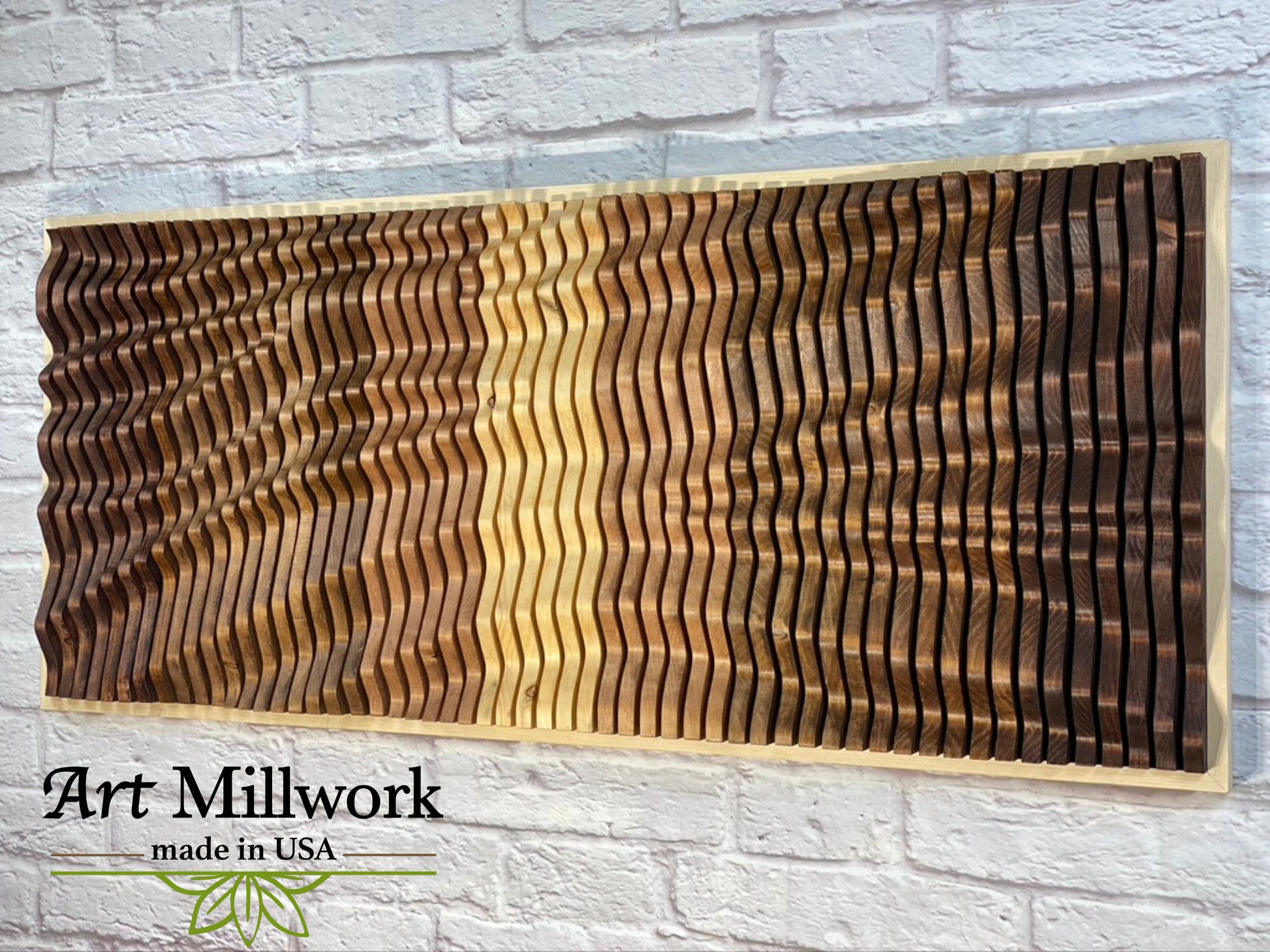 Close-up of VORTEX acoustic wood wall panel on white brick wall, highlighting handcrafted 3D wood wave patterns by Art Millwork USA.