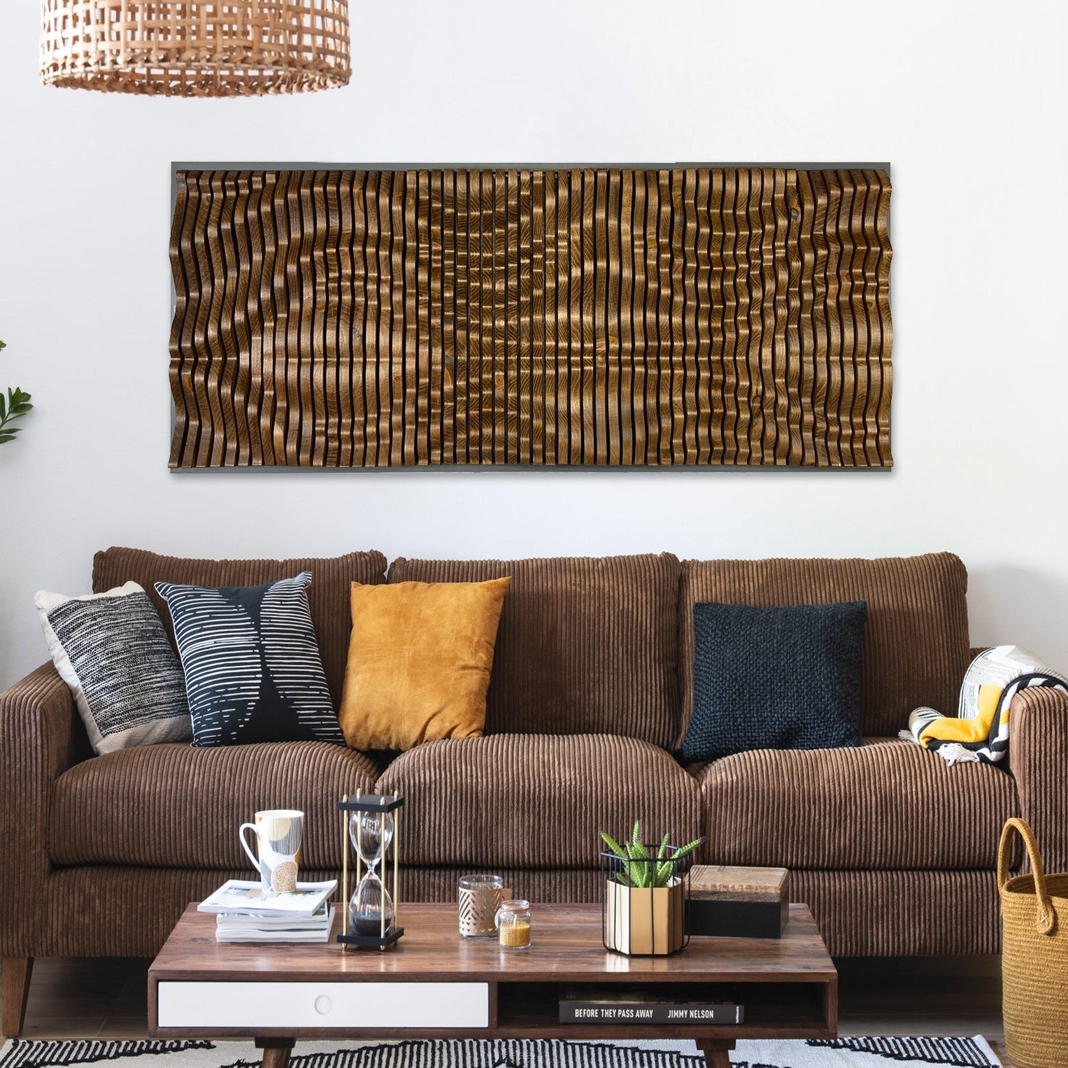 GOLIATHUS Wall Art - Acoustic Wall Art Panel in solid wood mounted above a brown corduroy sofa in a modern living room with neutral decor.