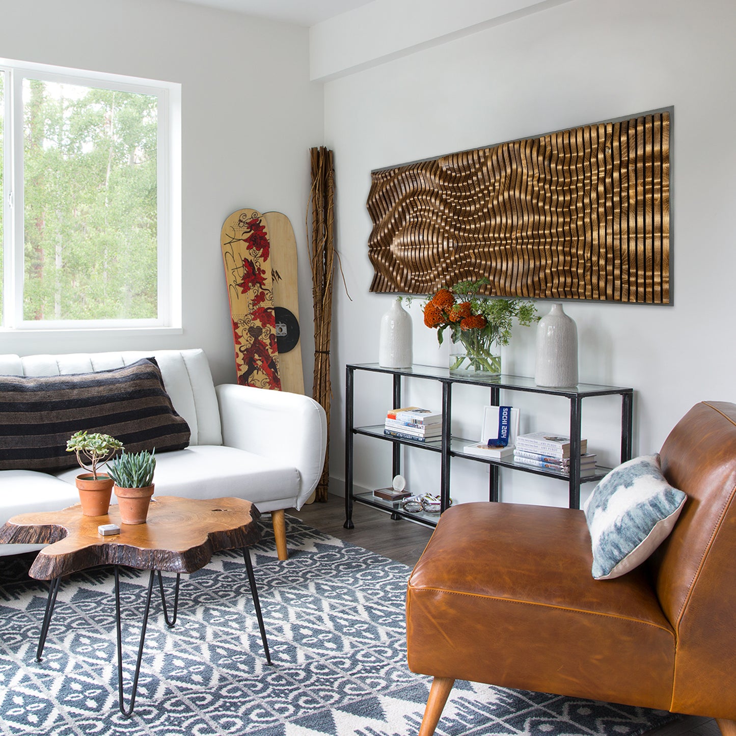 GOLIATHUS Acoustic Wall Art Panel in solid wood mounted in a bright modern living room with eclectic decor and natural light.